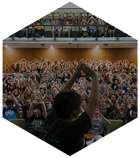 students raising their Os