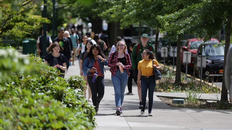 Students walking on 13 Ave.